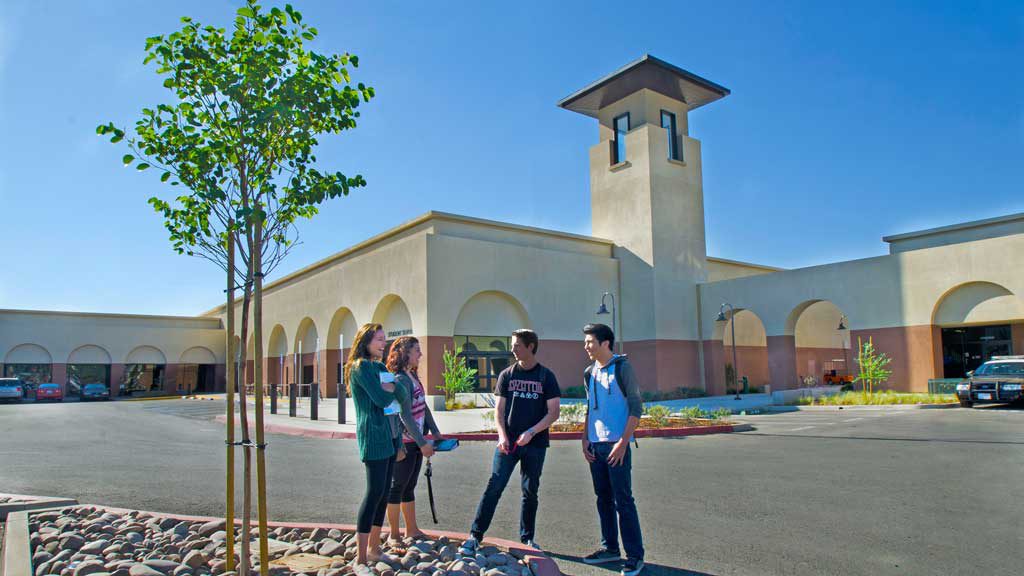 Students standing in front of the Escondido Center.