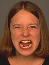 photo of a young woman screaming in anger