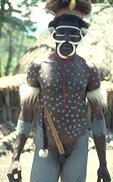 photo of a man from Papua New Guinea wearing a penis sheath