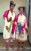 photo of two Hijras dressed in women's costumes to entertain clients