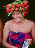 photo of a young Polynesian woman in colorful clothes