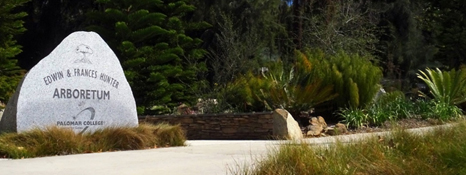 The Edwin and Frances Hunter Arboretum at Palomar College stone entrance sign.