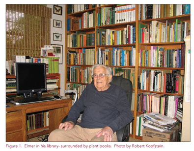 Elmer Lorenz sits in his library