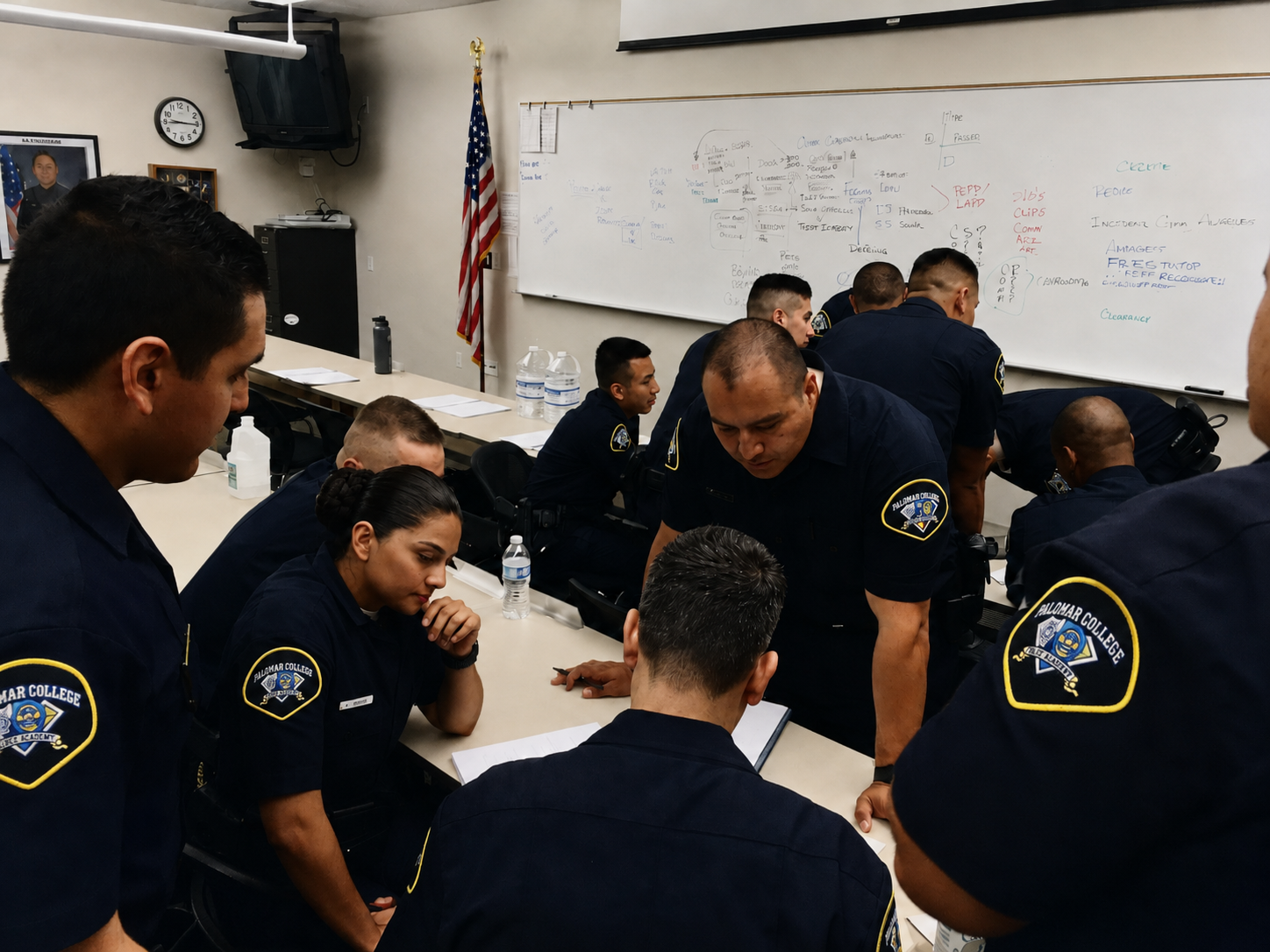 Police Academy officers in a classroom.