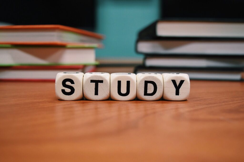 Block letters on a desk that spell study