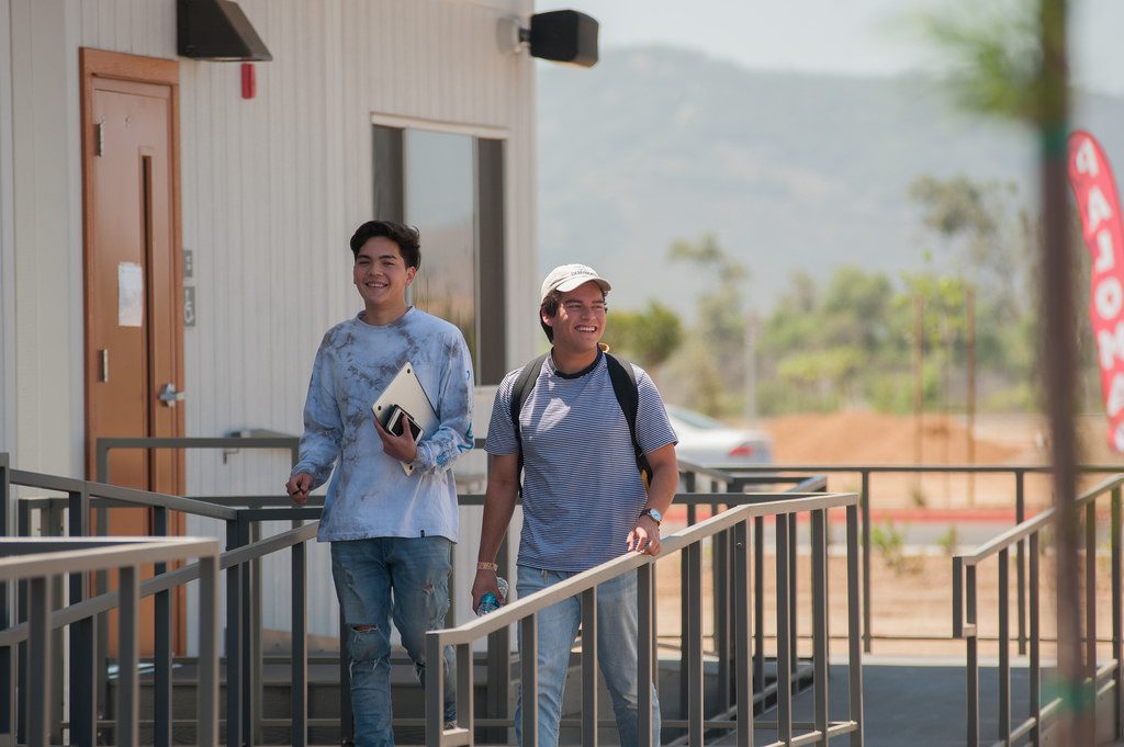 Two students going to class on the first day of the Summer 2018 semester.