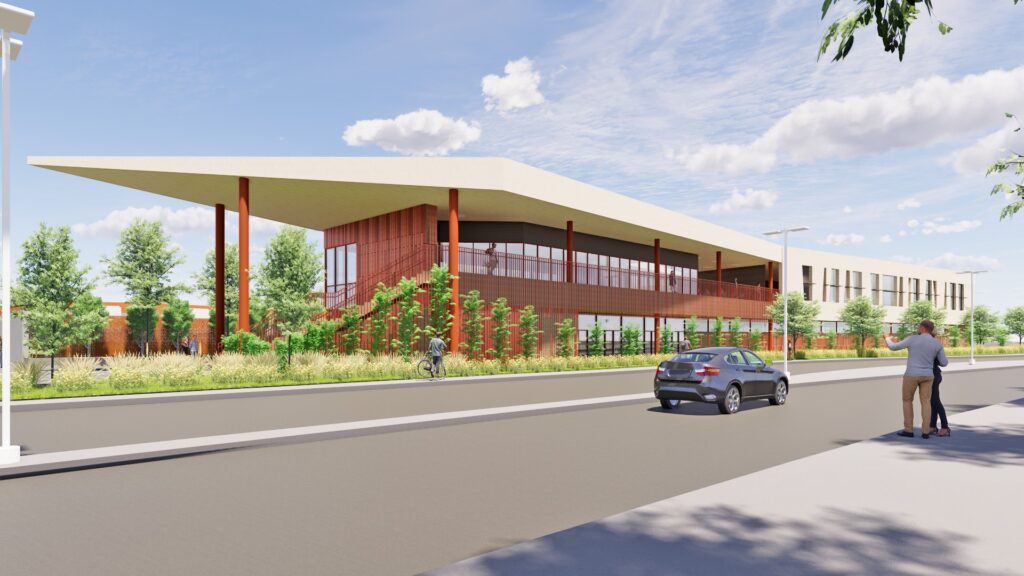 South exterior view of the two‑story Fallbrook 40 building with covered walkways and landscaping.