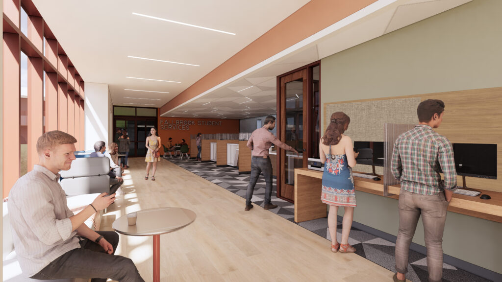 Interior view of the student services area with service counters, seating, and open circulation paths.