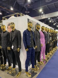 Male mannequins dressed in suits.