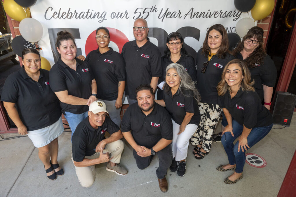 Image of the EOPS/CARE/CalWORKs and Foster Youth team celebrating the program's 55th anniversary