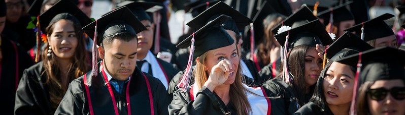 Students in caps and gowns at commencement ceremony 