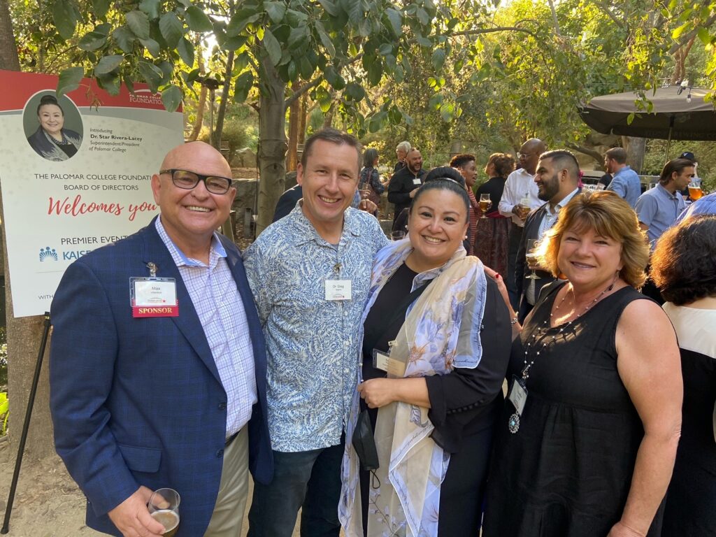 Palomar leadership and guests attending an outdoor event 