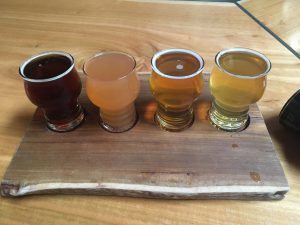 A flight of fresh apple cider in four different flavors. (Nick Ng/IMPACT Magazine)