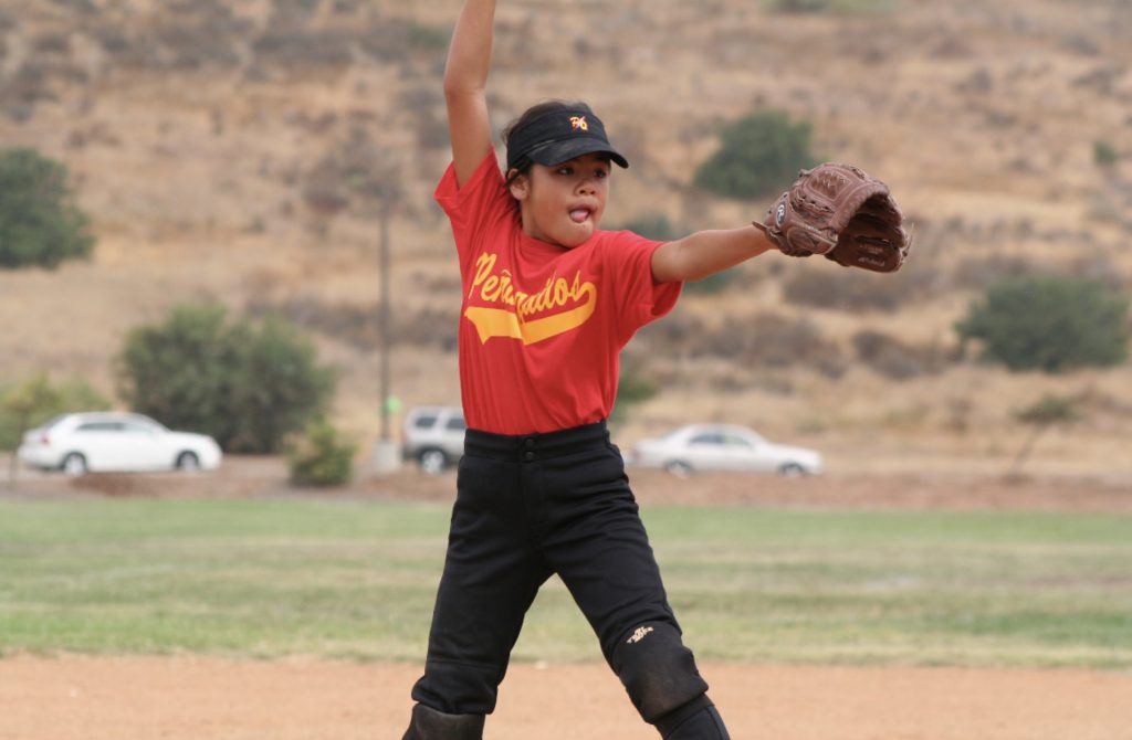 Alyssa Domingo, at age 8, pitches at a softball game in Escondido, Calif. (Phot courtesy of Alysssa Domingo.)
