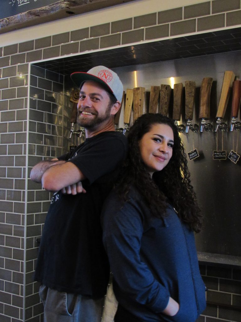 Bartenders Eric Gerber and Biana Potratz has been working at Newtopia Cyder since they first opened in January 2017. (Nick Ng/IMPACT Magazine)