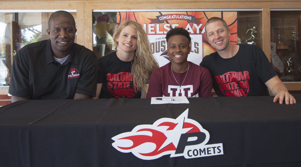 (l-r) Assistant Coach Damian Cephas, Head Coach Leigh Marshall, Chelse Ayala, and Assistant Coach Chris Kroesch following Ayala signing her letter of intent with Texas A&M International University on May 10, 2016 at The Dome. (Stephen Davis/The Telescope)