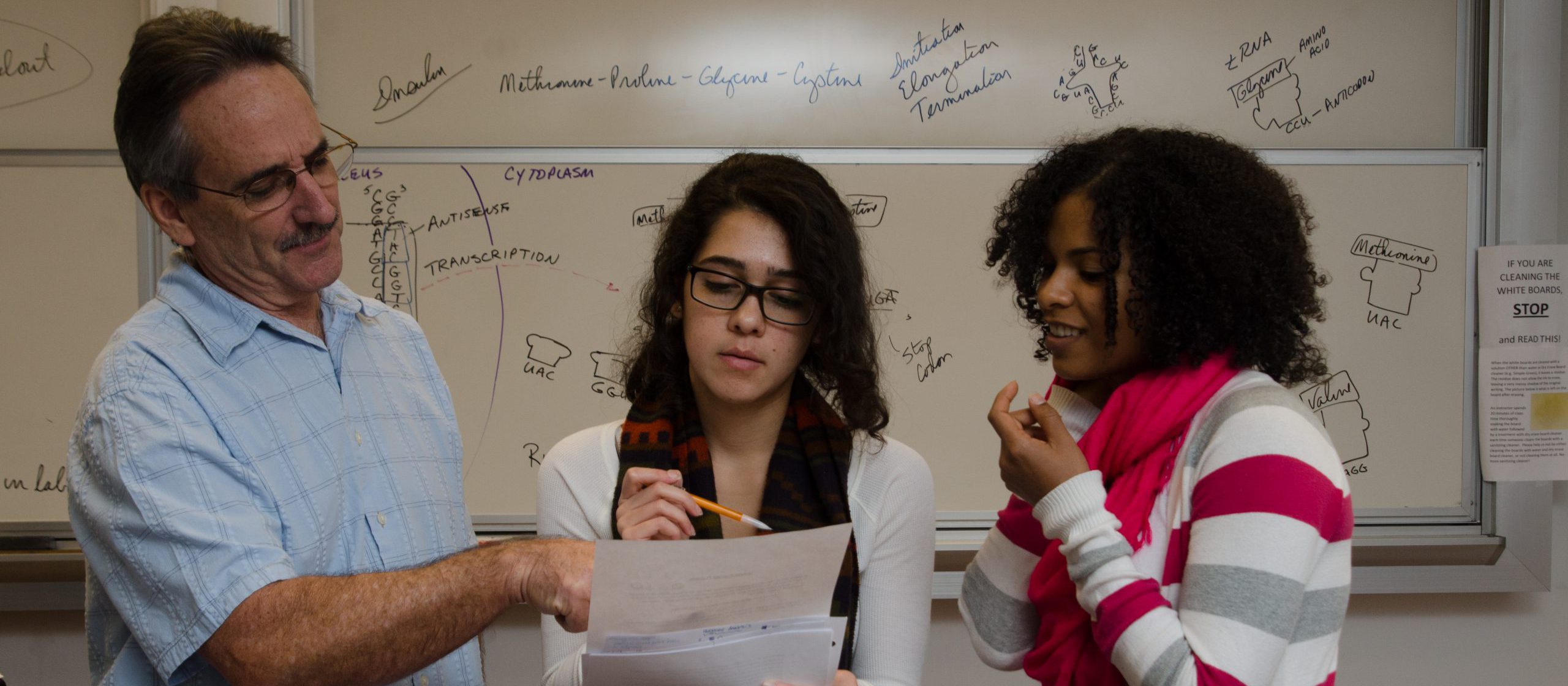 students and evaluation Two students with teacher