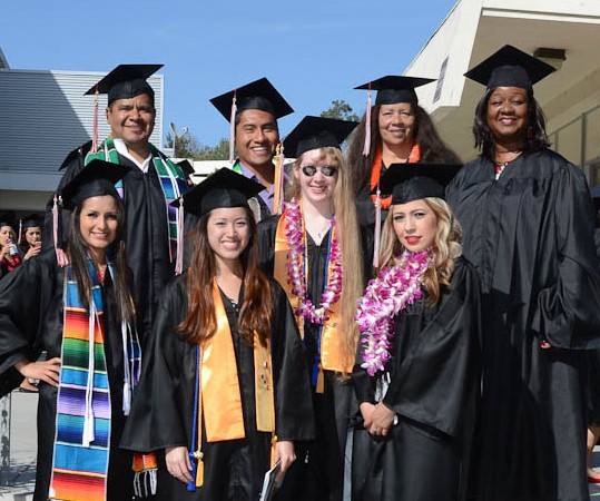 Group of graduates in caps and gowns 
