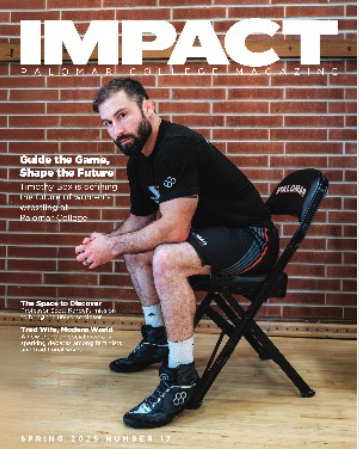 Impact Magazine cover with man sitting on chair in front of brick wall.