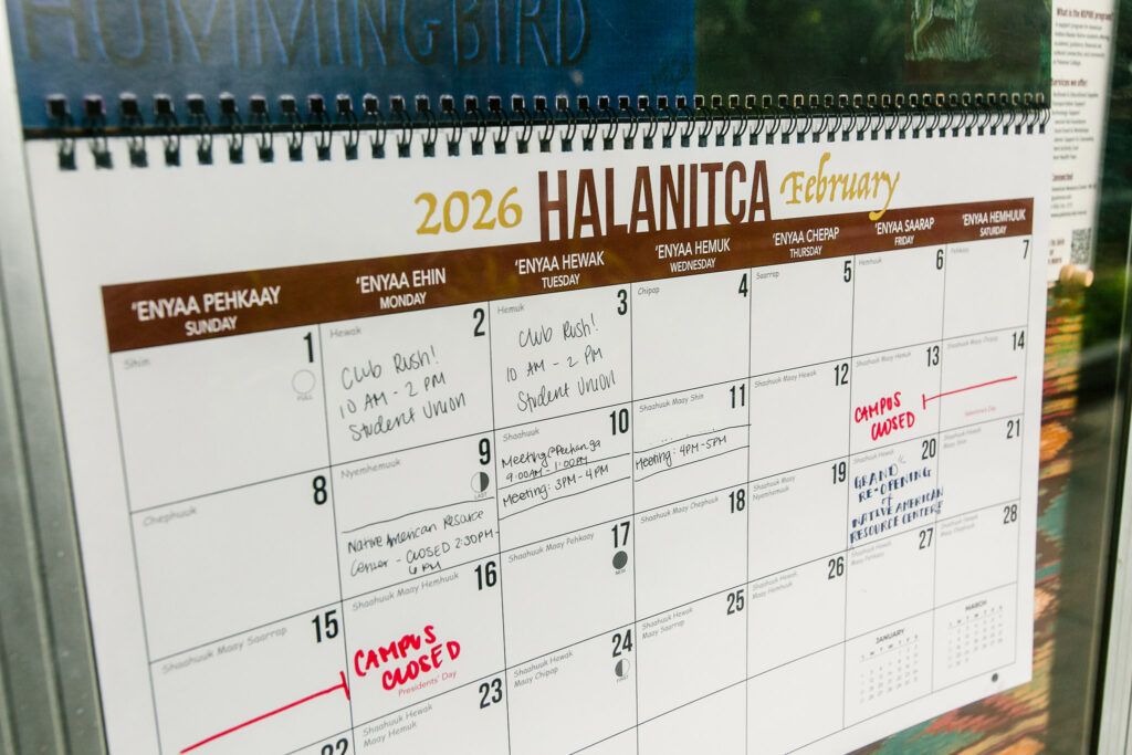 A wall calendar labeled "Halantca February 2026" with handwritten notes for campus activities, closures, and events.