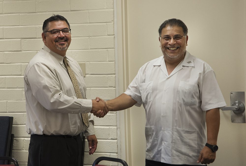 Palomar College Governing Board President congratulating he College’s incoming Interim Superintendent/President
