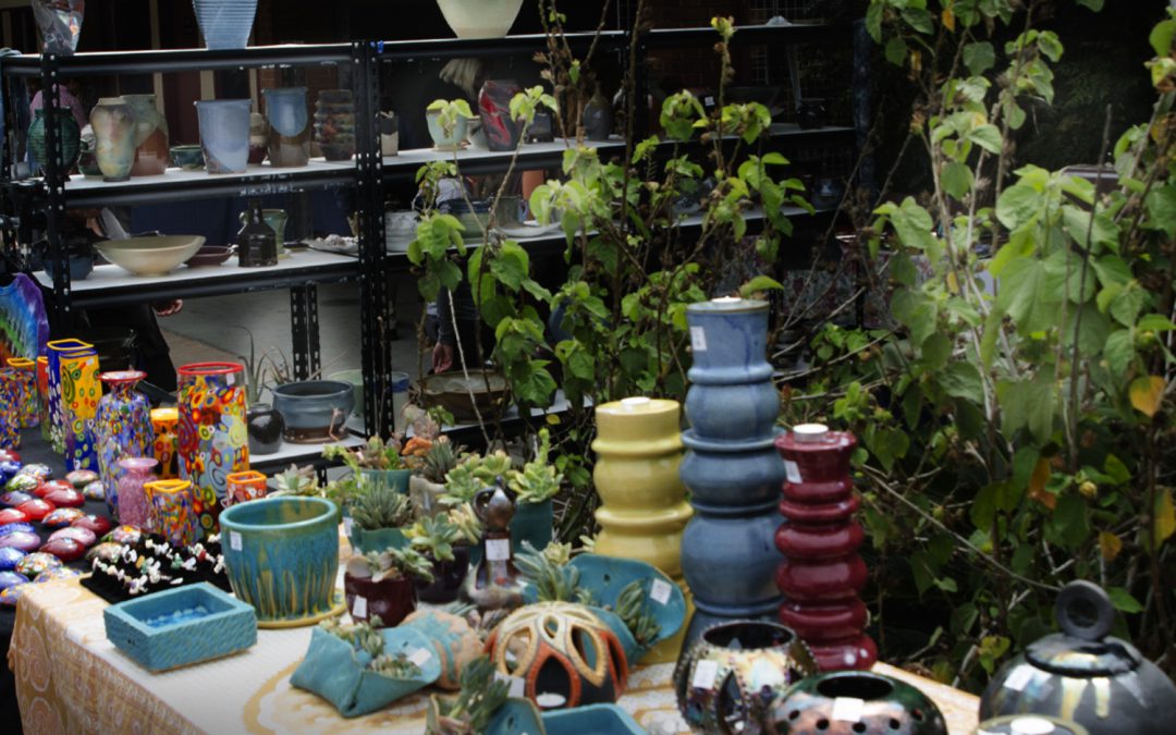 Table filled with items for the art sale