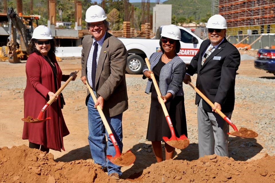 Palomar leadership shoveling dirt and a groundbreaking ceremony