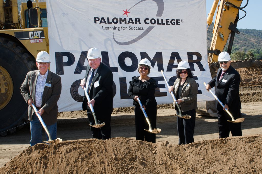 Palomar leadership holding shovels at groundbreaking ceremony