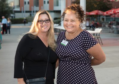Two attendees at Guests attending the Tarde de Familia event
