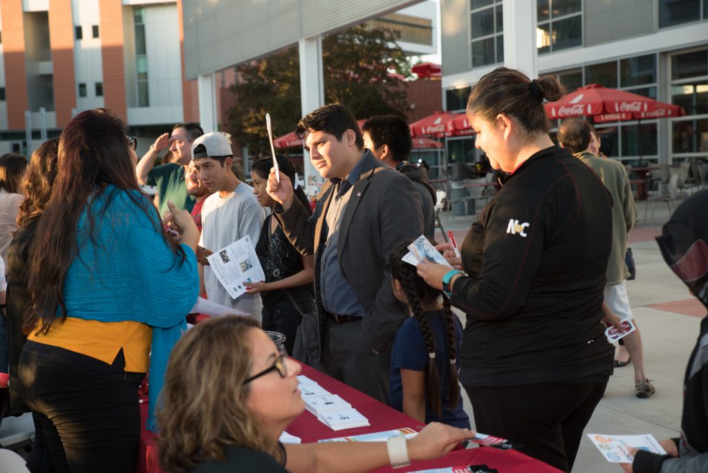 Guests receiving information about College services