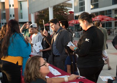 Guests receiving information about College services