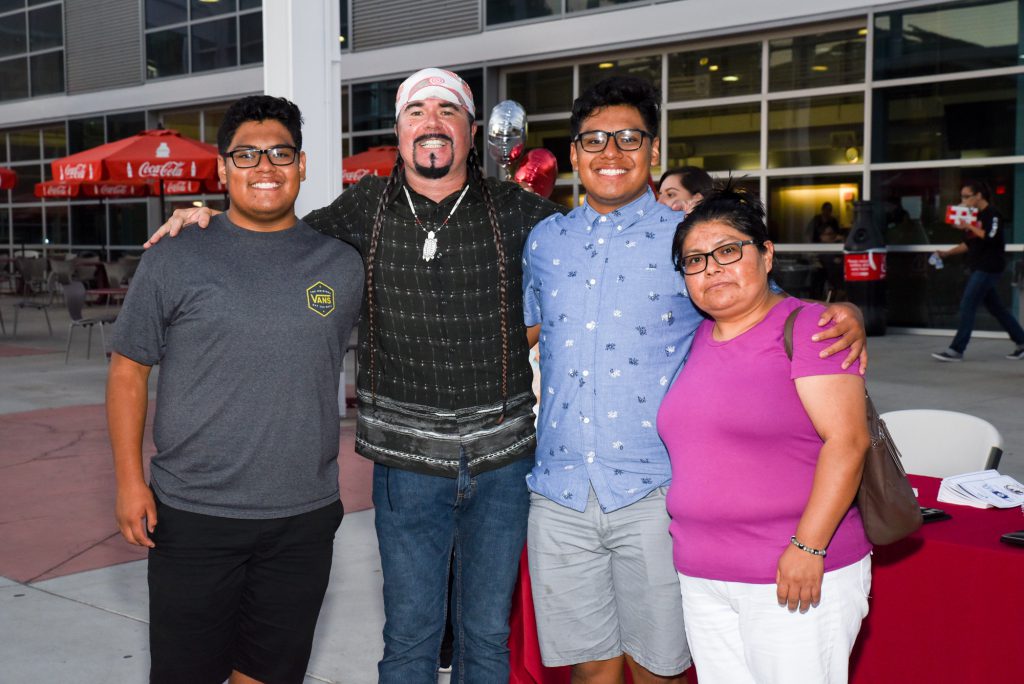 Guests attending the Tarde de Familia event