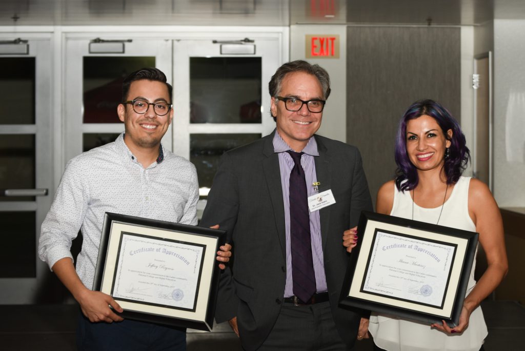 Special guest speakers holding Certificates of Appreciation and standing with Dr. Jack Kahn