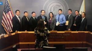 Community college officials posing for a photo