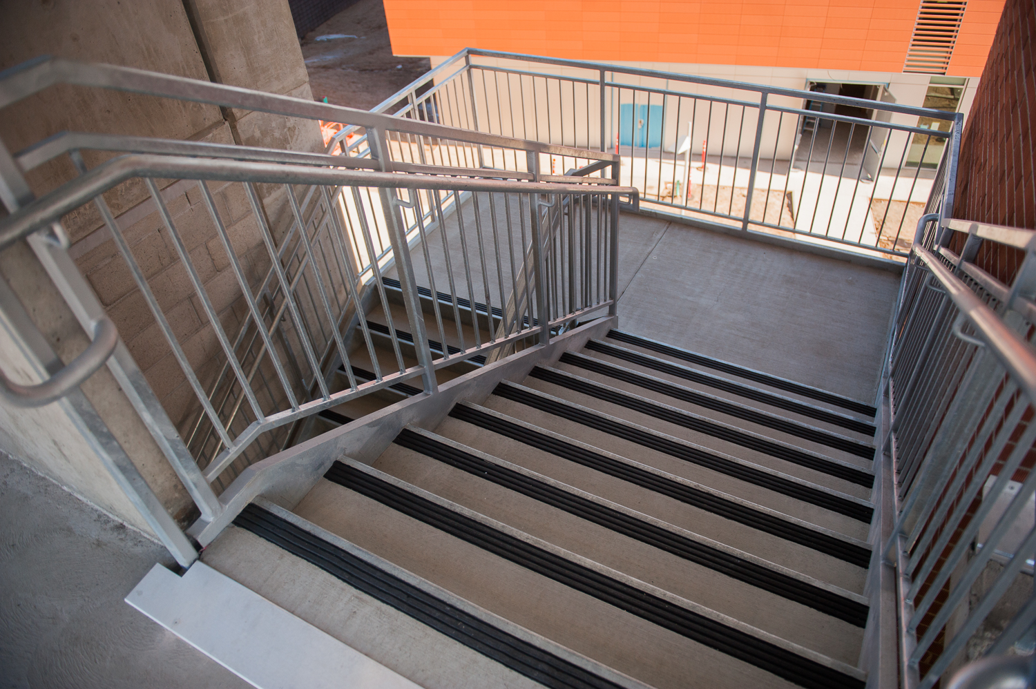 View of stairs inside parking garage
