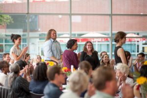 Recipients of the Library Technology Scholarship stand with Palomar College Public Services Librarian during Honors Night event