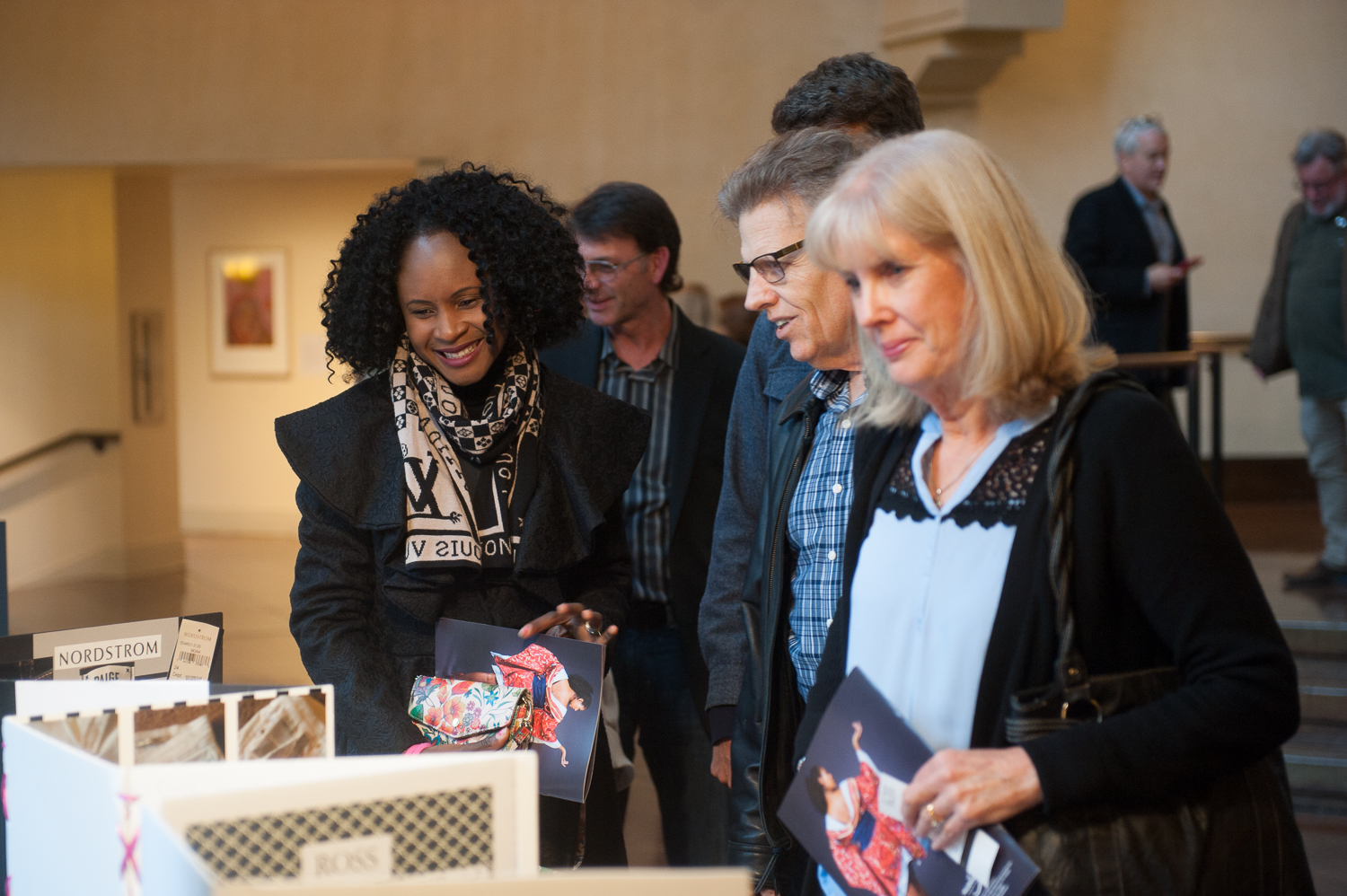 Visitors admire student work on display