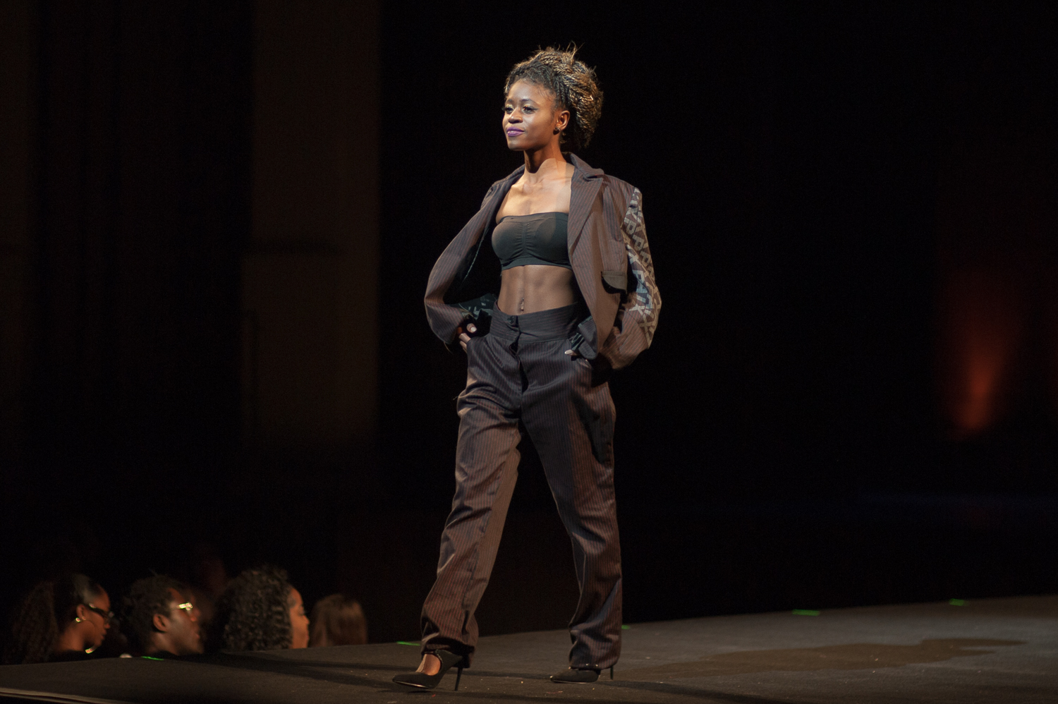 Model walking on stage at a fashion show