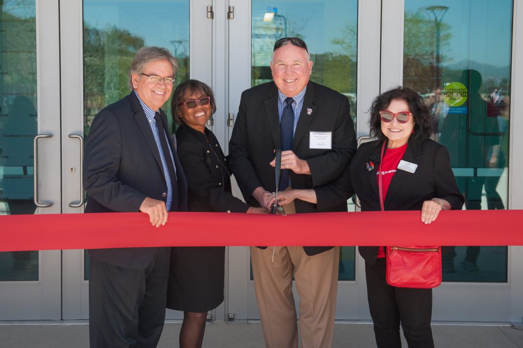 Palomar leadership cutting a red ribbon at the Rancho Bernardo campus