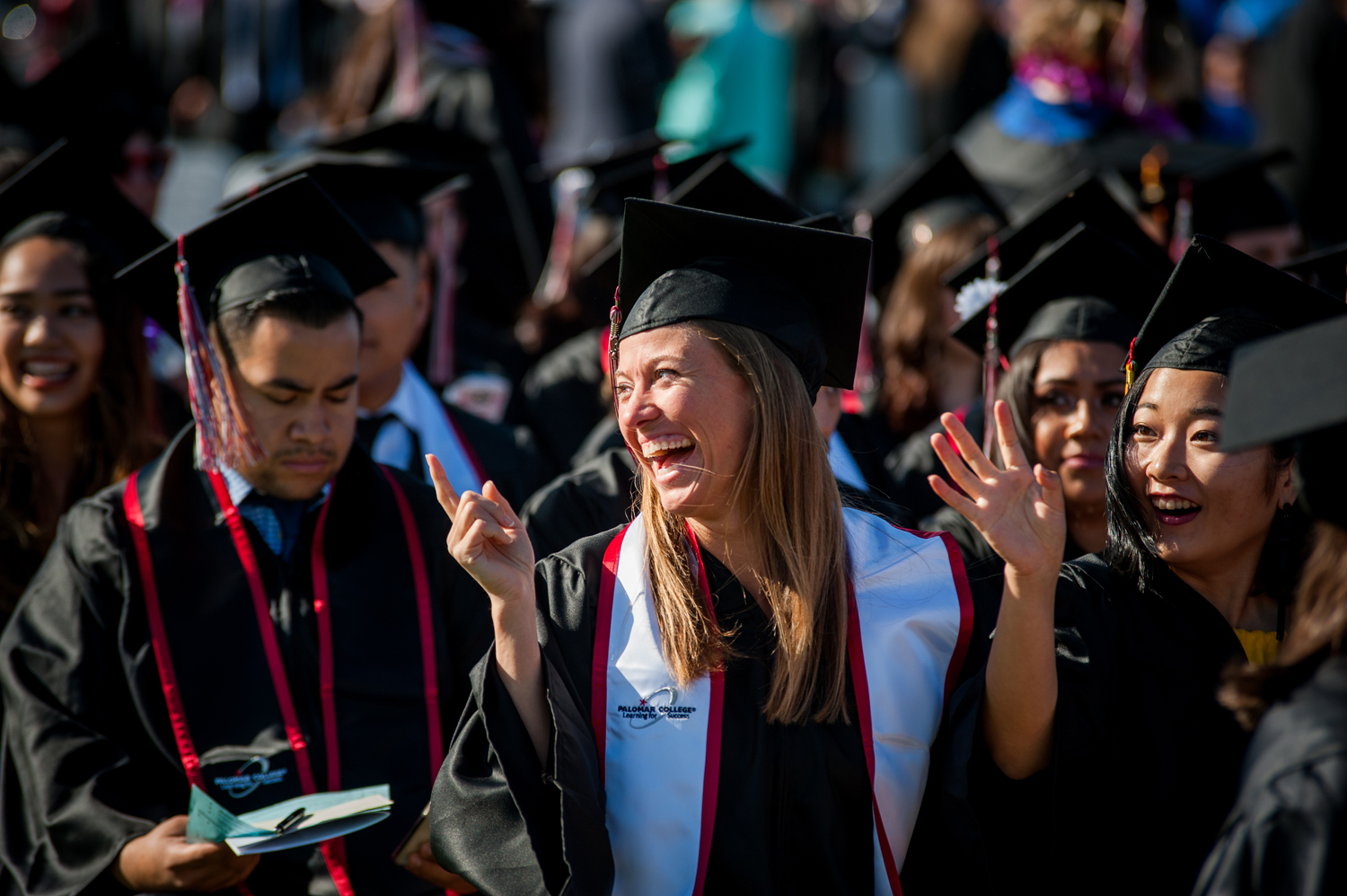 Grads in caps and gowns at commencement