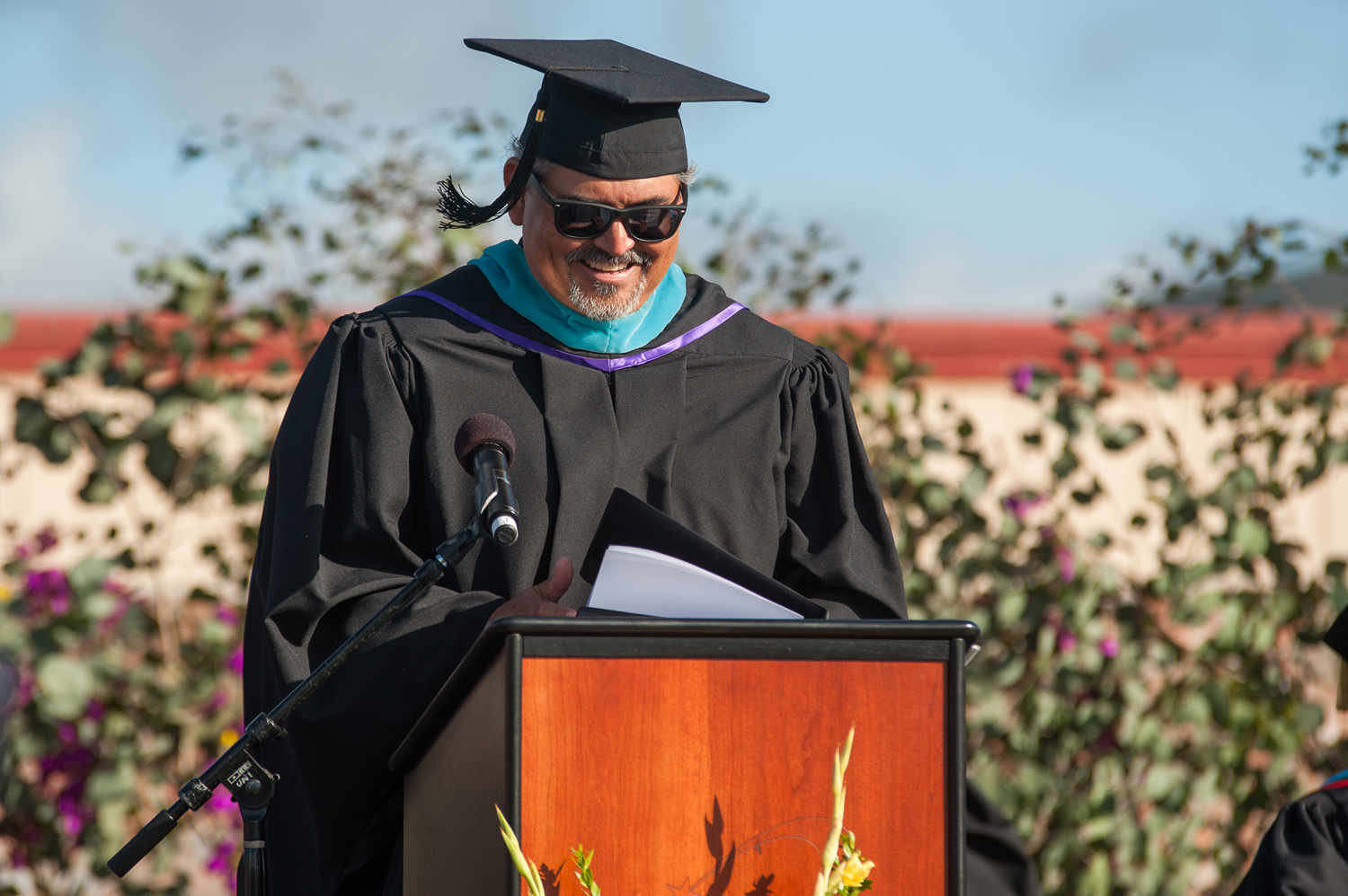 Speaker at podium at commencement