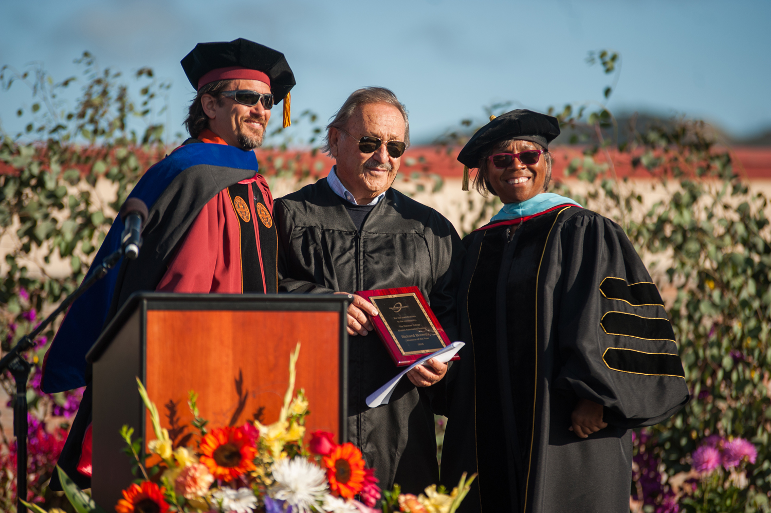 Leadership on stage at commencement