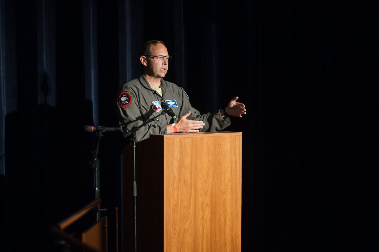 Air Force Col. Jeremy Zadel speaking at a podium during Palomar College Drone-Con 2018.