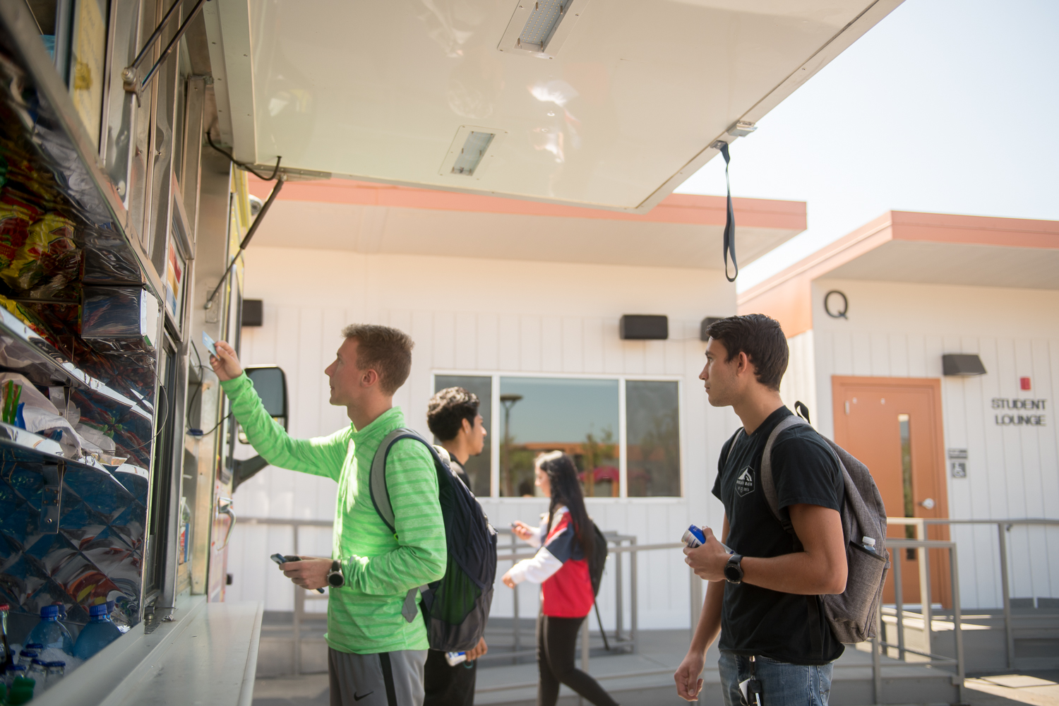 Students ordering lunch from a food truck