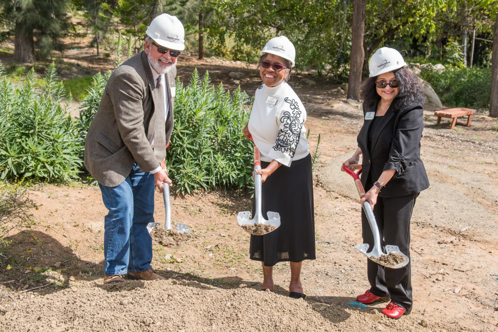 Palomar leadership holding shovels and breaking ground on arboretum trail