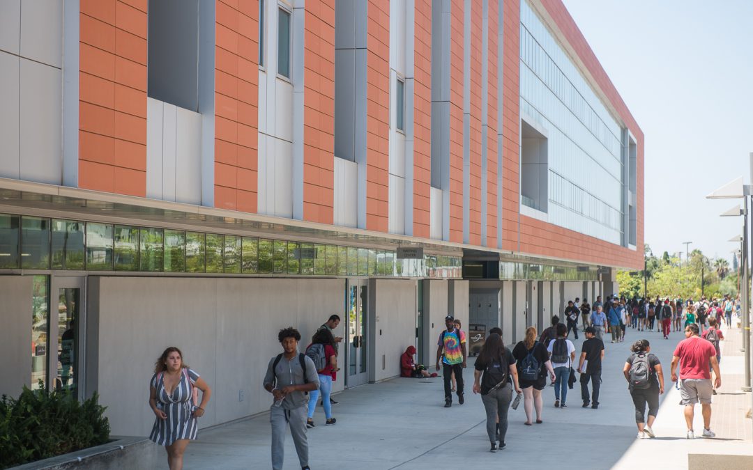 Busy campus filled with students walking to class