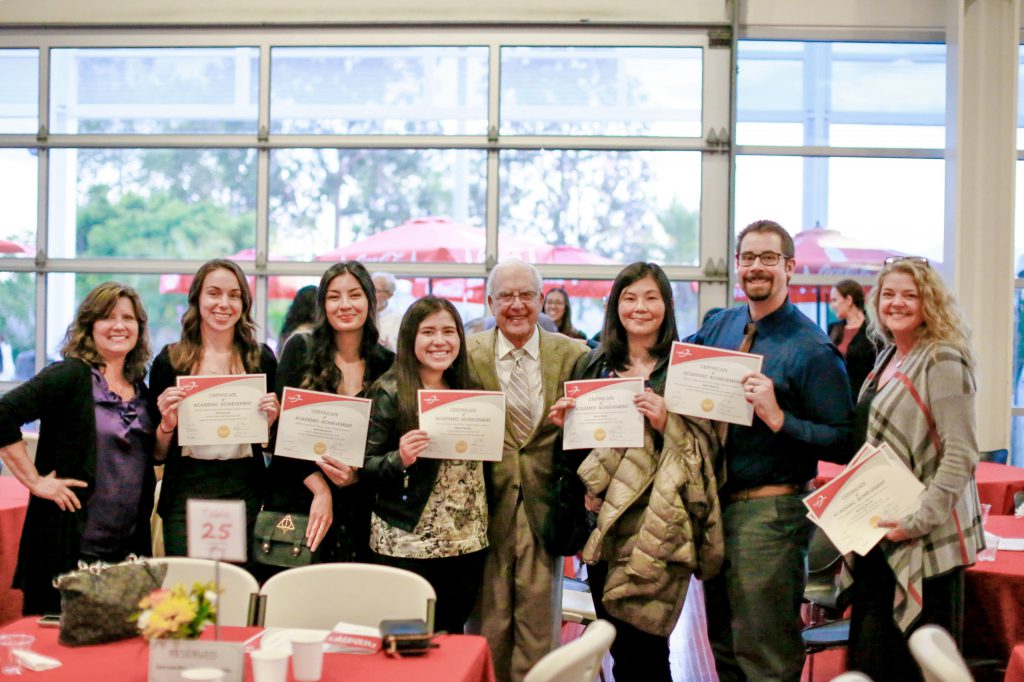 Palomar College scholarship recipients holding certificates