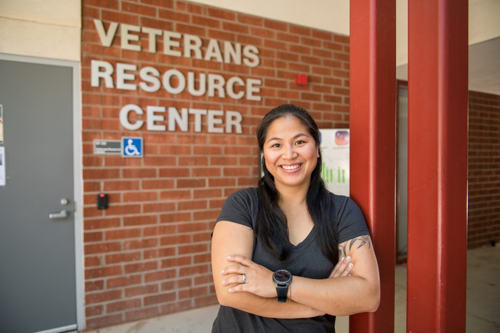 Palomar alum Lydia Keaty standing in front of the Veterans Resource Center building