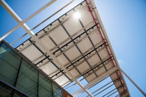 The operations wing of the M&O Building outfitted with solar panels