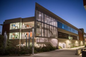Exterior shot of a lit up MD building at dusk